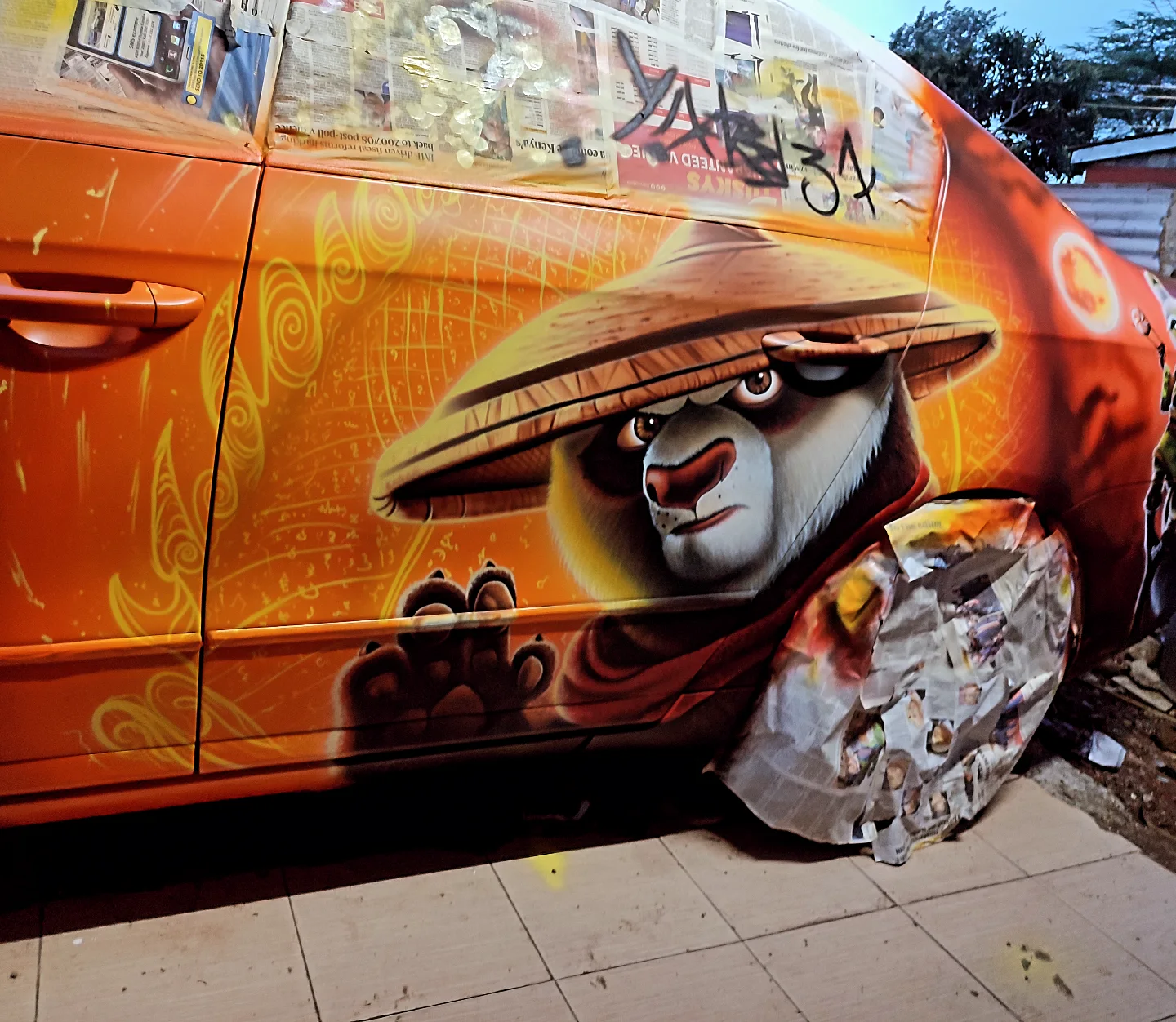 Orange car with Kung Fu Panda airbrush by Setik